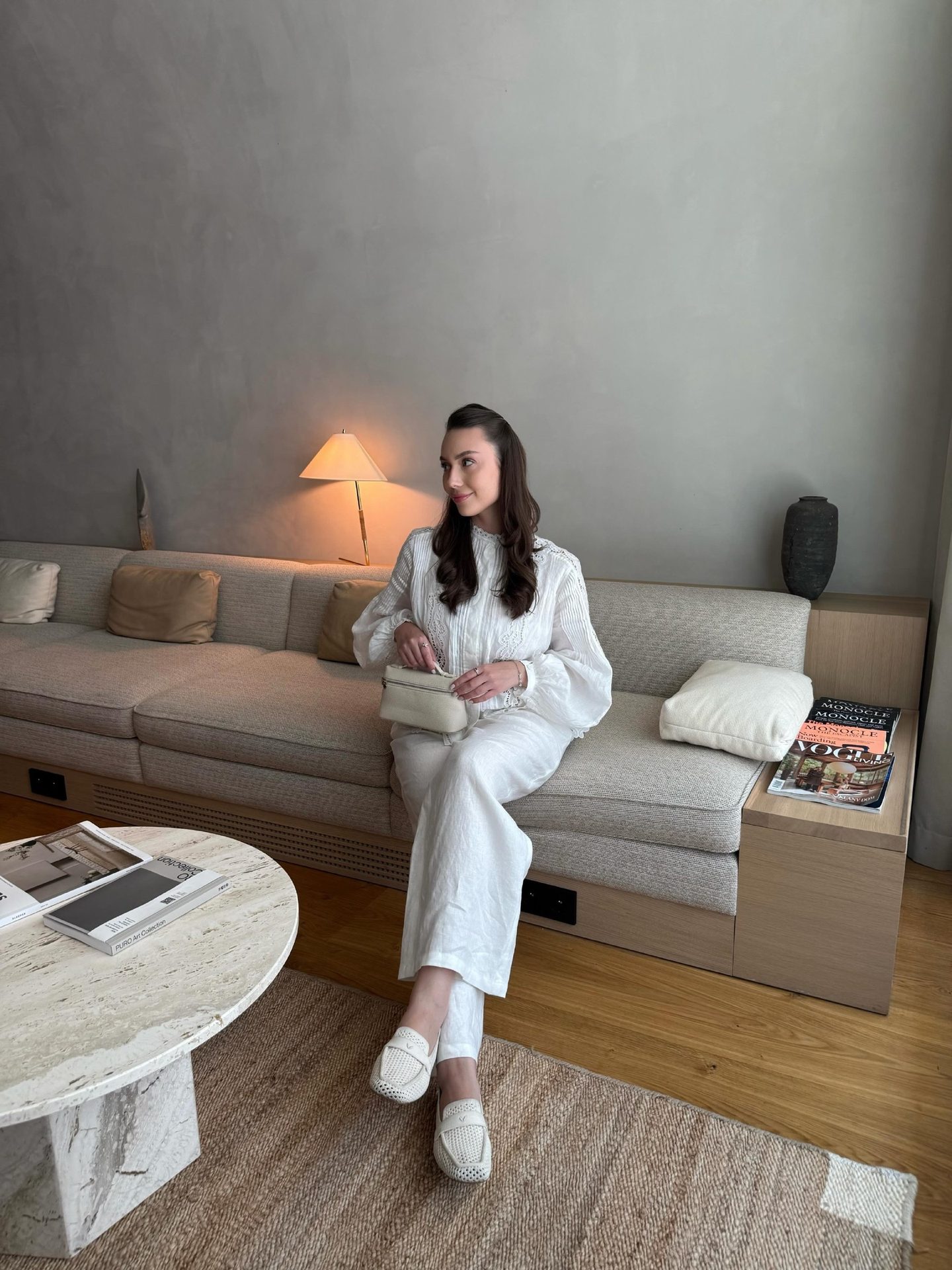 Richradiqs — white linen suit in a warm minimalist interior, frame 2