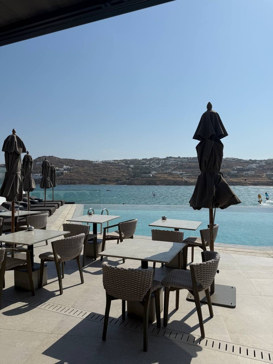 Aeonic Suites & Spa, Mykonos — stone bath, Cycladic stair and pool terrace, frame 4