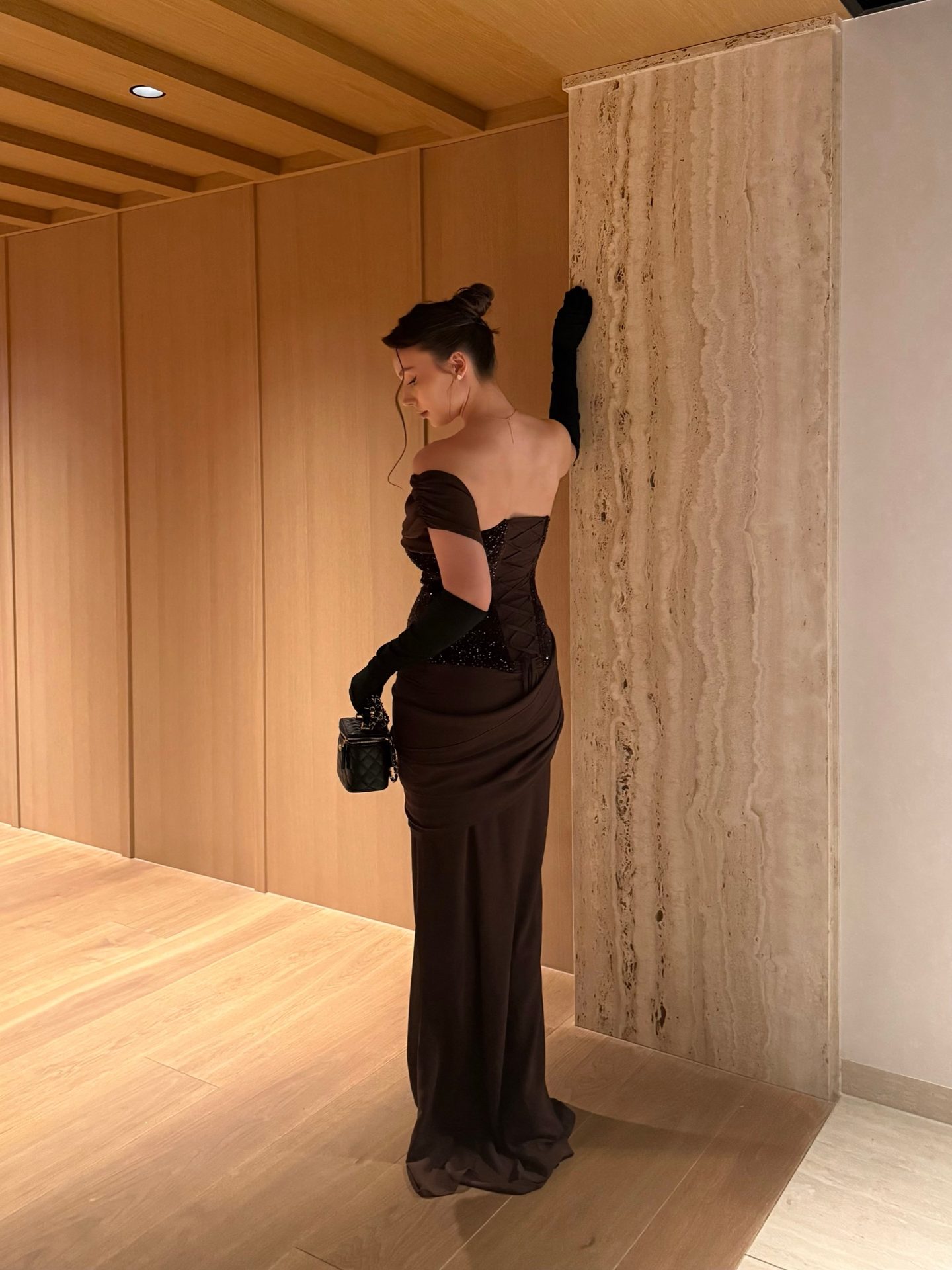 Bella Barnett — brown corset gown, frame 4